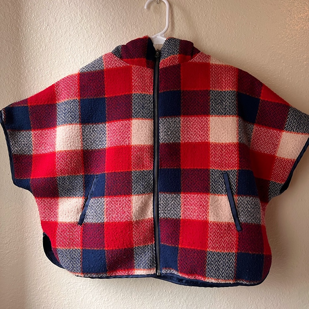 It does run a little big and can fit and adult size small